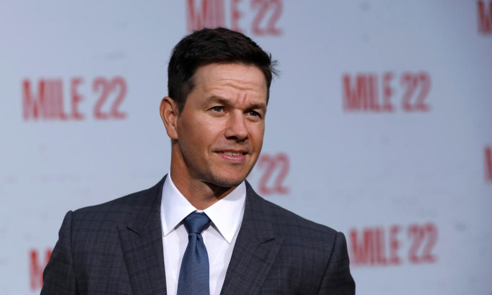 Cast member Mark Wahlberg poses at the premiere for "Mile 22" in Los Angeles, California, U.S., August 9, 2018. REUTERS/Mario Anzuoni