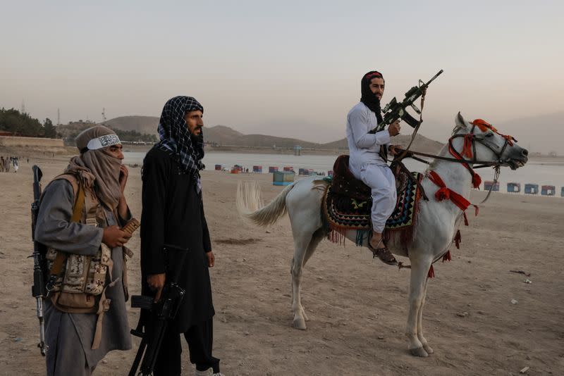 Taliban fighters flock to Kabul recreation spot for a day off