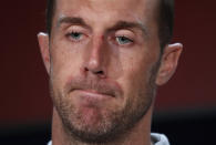 FILE - Washington Redskins quarterback Alex Smith speaks at a news conference after an NFL football game against the Indianapolis Colts in Landover, Md., in this Sunday, Sept. 16, 2018, file photo. Alex Smith is retiring from the NFL after making an improbable comeback from a broken leg. Smith announced his retirement Monday, April 19, 2021, on Instagram, saying he still has plenty of snaps left him just shy of his 37th birthday but is calling it quits to enjoy time with his family. (AP Photo/Alex Brandon, File)