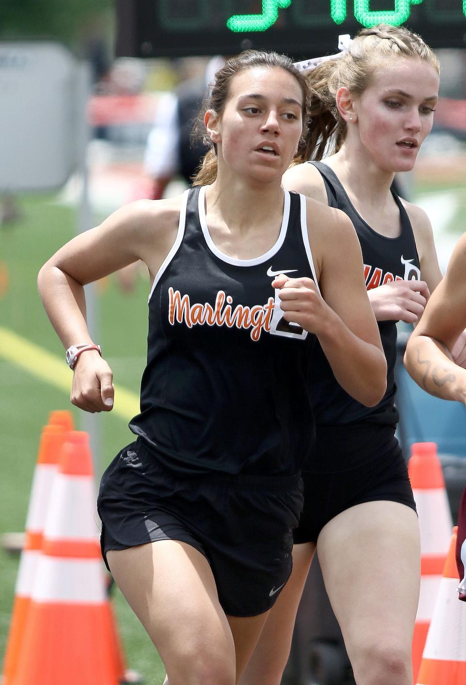 Marlington's Bella Graham during the girls 1600 meter final at the Division II track and field regional finals held at Austintown Fitch High School, Saturday, May 28, 2022.