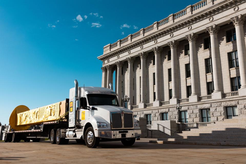 The Golden Spike Monument arrives in front of the Utah state Capitol in Salt Lake City on Monday, Oct. 23, 2023. The 43-foot-tall golden spike was commissioned as a public art piece by the Golden Spike Foundation to honor the tens of thousands of railroad workers who built the transcontinental railroad. | Megan Nielsen, Deseret News