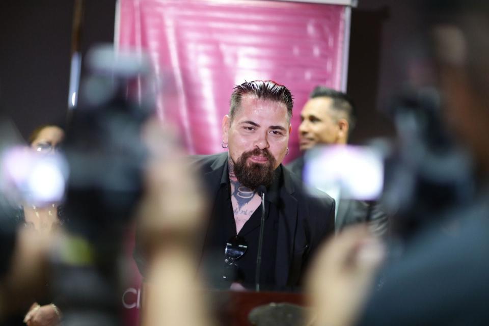 Mexican professional wrestler Pagano (Jose Julio Pacheco) speaks at a news conference about growing up watching luchadores being inducted into the Juárez Lucha Libre Hall of Fame.