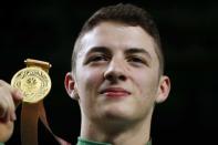 Artistic Gymnastics - Gold Coast 2018 Commonwealth Games - Men's Pommel Horse - Coomera Indoor Sports Centre - Gold Coast, Australia - April 8, 2018. Gold medalist Rhys McClenaghan of Northern Ireland poses. REUTERS/David Gray