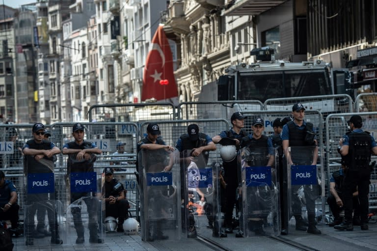 Anti-riot police prevent a Saturday Mothers' gathering