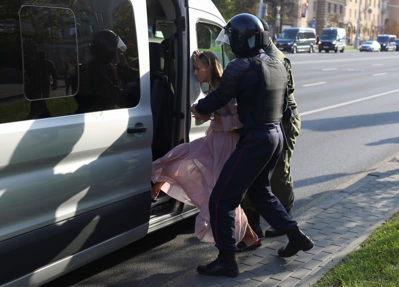 Belarusian opposition supporters hold a rally in Minsk