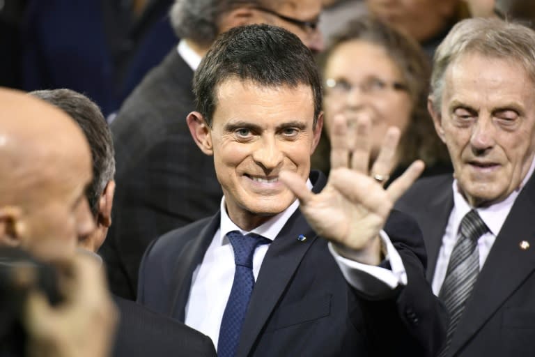 French Prime Minister Manuel Valls greets supporters after announcing his bid to become the Socialist presidential candidate in the 2017 presidential elections, at the town hall of Evry