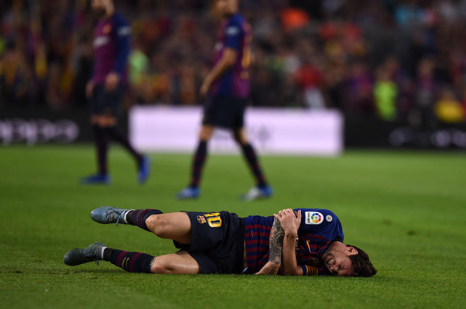 Lionel Messi suffered a broken arm during Barcelona’s game against Sevilla. (Getty)