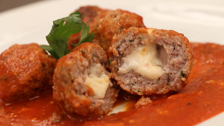 Meatballs stuffed with white cheese