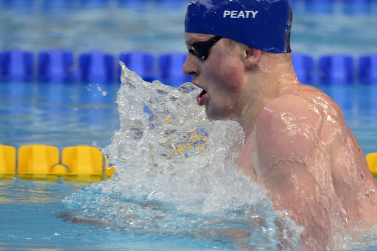 Adam Peaty set a new championship record in the heats to reach the 100m breaststroke semi-finals at the world championships in Kazan on August 2, 2015