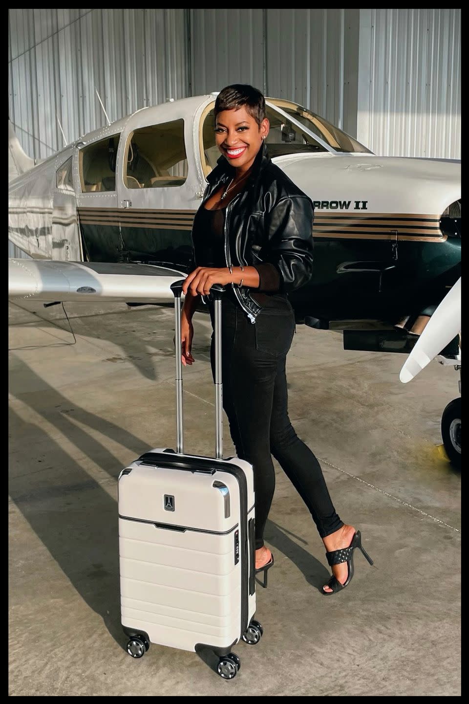<p>"My current go-to bag is my Travelpro x Travel + Leisure Compact Carry-On Expandable Spinner that I found out about online. It not only fits in any overhead compartment (including regional jets), but it also has three internal zipper compartments and a removable zip off toiletry bag! Since I’m also <a href="https://www.kelleesetgo.com/" rel="nofollow noopener" target="_blank" data-ylk="slk:a pilot;elm:context_link;itc:0;sec:content-canvas" class="link ">a pilot</a> who flies single engine aircraft and seaplanes, this carry on fits easily in the small cargo area for luggage or in the back seat and provides reassurance that my bag will never be too heavy for weight and balance purposes." —<a href="https://www.instagram.com/kelleesetgo/" rel="nofollow noopener" target="_blank" data-ylk="slk:@kelleesetgo;elm:context_link;itc:0;sec:content-canvas" class="link ">@kelleesetgo</a></p>