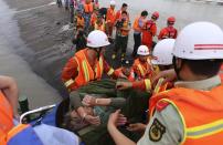 An elderly survivor is rescued from the Dongfangzhixing ferry which sank in the Yangtze river on June 2, 2015