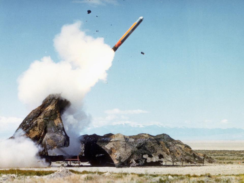 A missile is launched from a camouflaged launcher at Dugway in 1985.