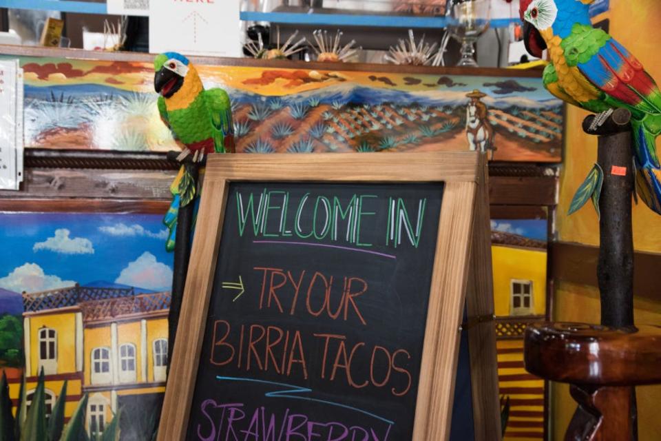 The birria tacos served daily at Guadalajara restaurant in Lake Park are a chalkboard menu item.