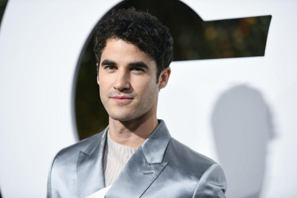 Darren Criss smiling at an event