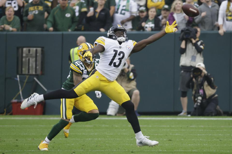 Pittsburgh Steelers' James Washington can't get to a p[ass in front of Green Bay Packers' Jaire Alexander during the first half of an NFL football game Sunday, Oct. 3, 2021, in Green Bay, Wis. (AP Photo/Mike Roemer)