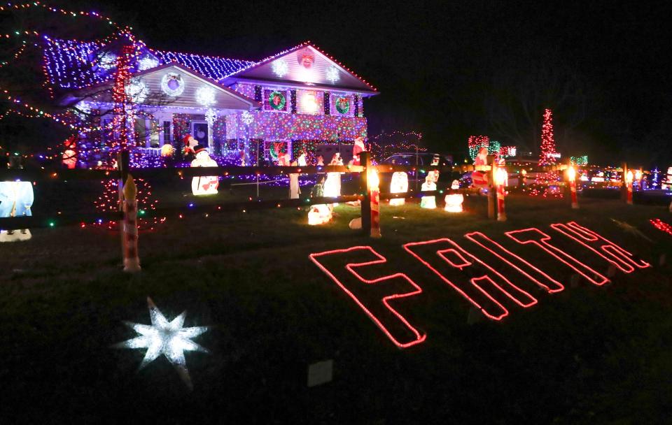 A house is bedecked in Christmas decor on Red Lion Road - also known as 1 Santa Claus Lane - in New Castle, Delaware.