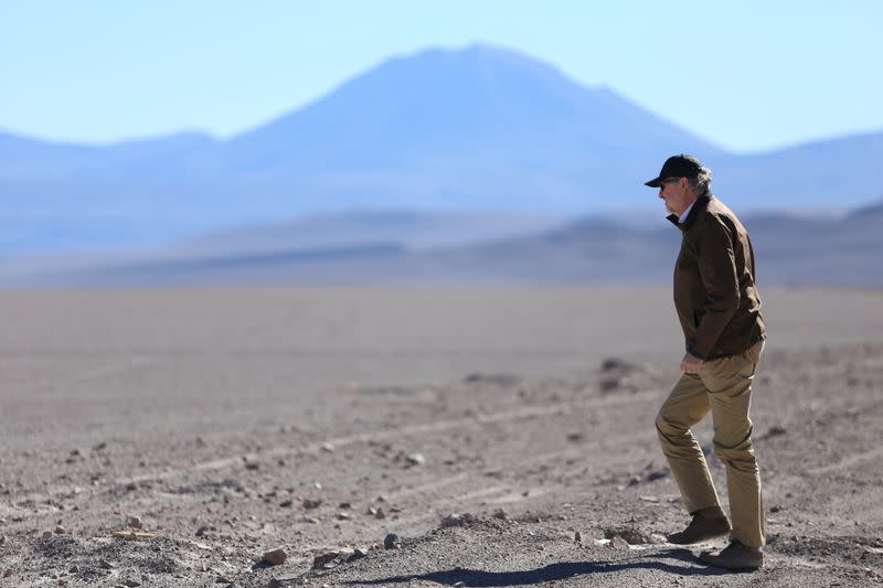 FILE PHOTO: Chile's Minister of Mining Baldo Prokurica walks on Pedernales Salt Flat in the Atacama Desert