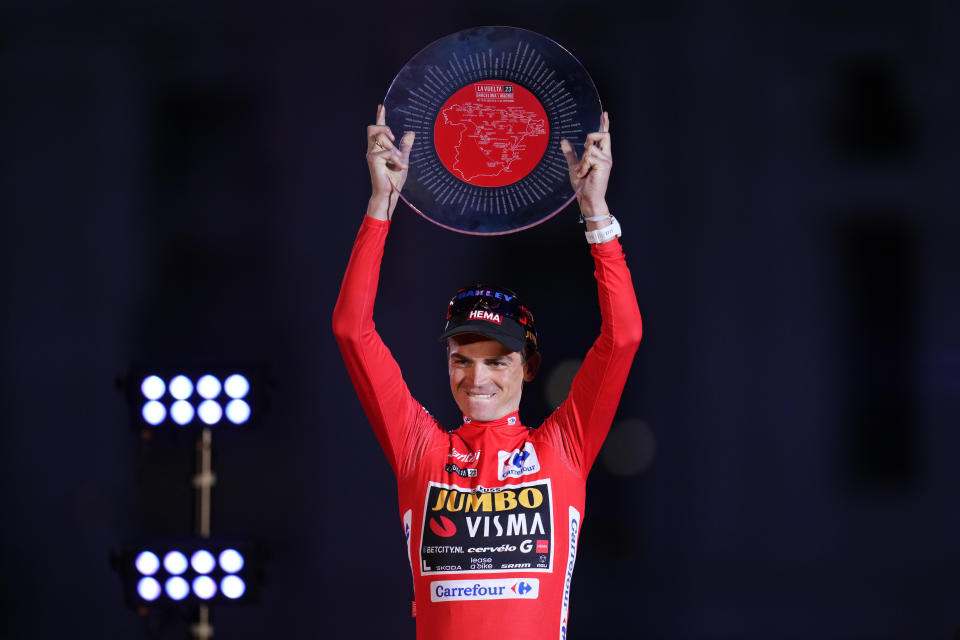 Sepp Kuss of Jumbo-Visma celebrates on the podium after winning the 21st stage of the Vuelta cycling race between Hipodromo de La Zarzuela and Madrid, Spain, Sunday, Sept. 17, 2023. (AP Photo/Manu Fernandez)