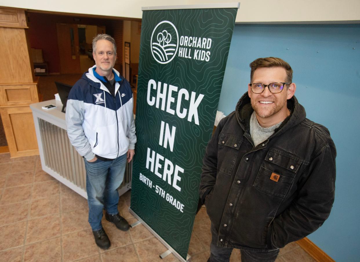 John Stahl, left, missionary at the newly formed Orchard Hill Church, and Rev. Drew Causey, pastor of the church, helped to coordinate an effort to merge RiverTree church in Canal Fulton and High Point Church in Clinton. Orchard Hill's first service is slated Sunday.