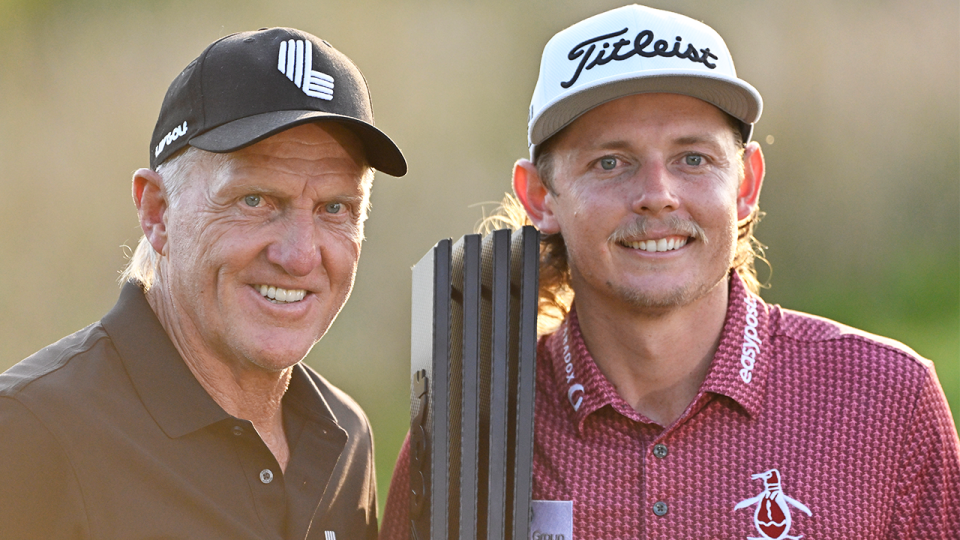 Cameron Smith (pictured right) holds and LIV Golf trophy next to Greg Norman (pictured left).