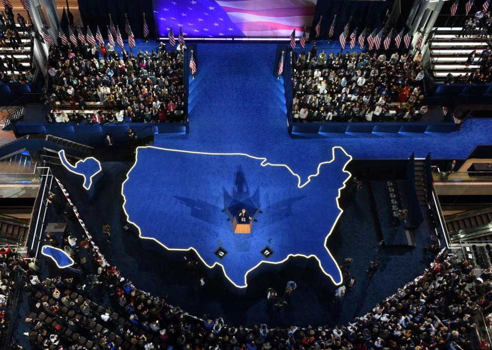 Hillary Clinton's campaign manager, John Podesta, addressing the crowd gathered during election night at the Javits Center in New York City.