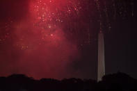 <p>Smoke and sparks from Independence Day celebration fireworks around the Washington Monument along the National Mall in Washington, on July 4, 2017. (Samuel Corum/Anadolu Agency/Getty Images) </p>