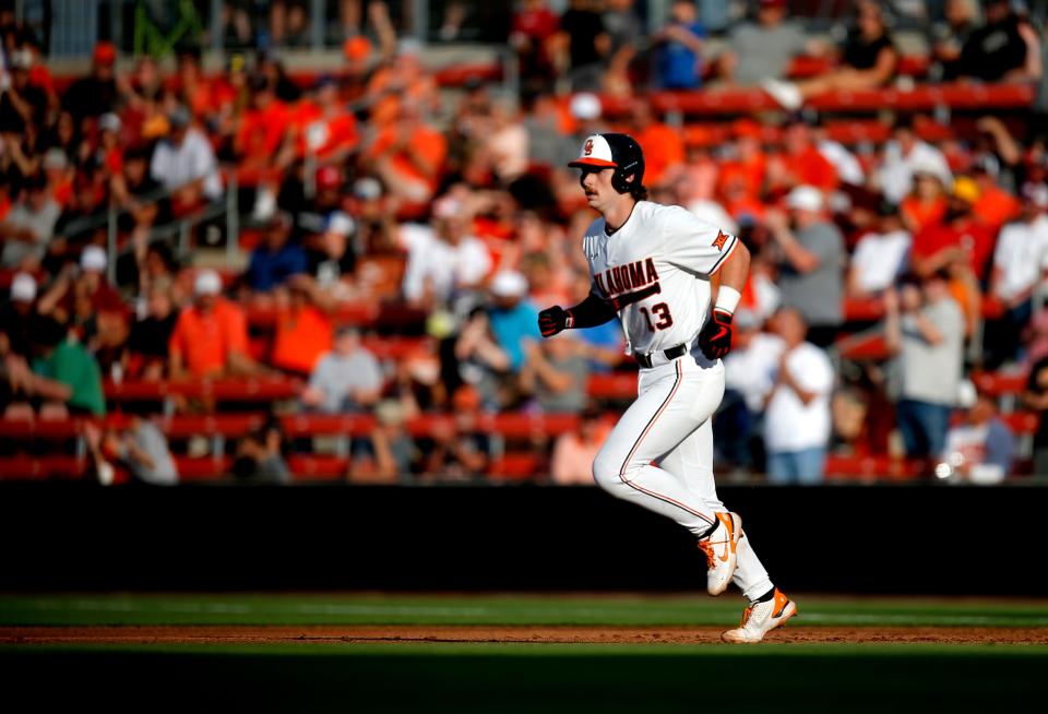 Oklahoma State's Nolan McLean (13) rounds the basses after a home run in the second inning during the NCAA Stillwater Regional baseball game between Oklahoma State Cowboys and Missouri State Bears at the O'Brate Stadium in Stillwater, Okla., Friday, June, 3, 2022. 