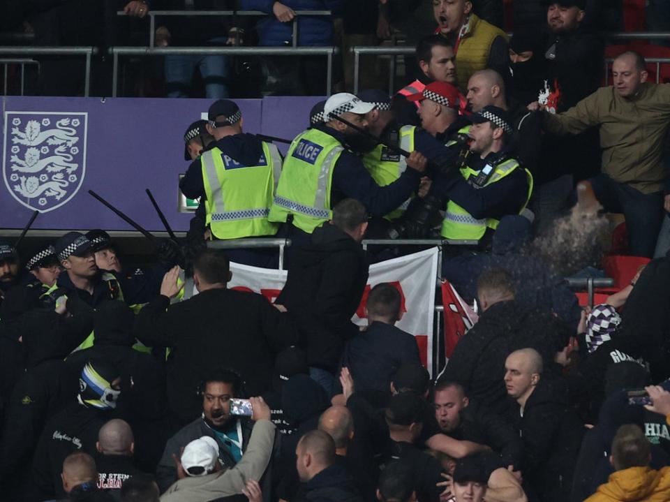 Hungary fans clash with police during the 2022 FIFA World Cup Qualifier match between England and Hungary at Wembley Stadium (Julian Finney/Getty Images)