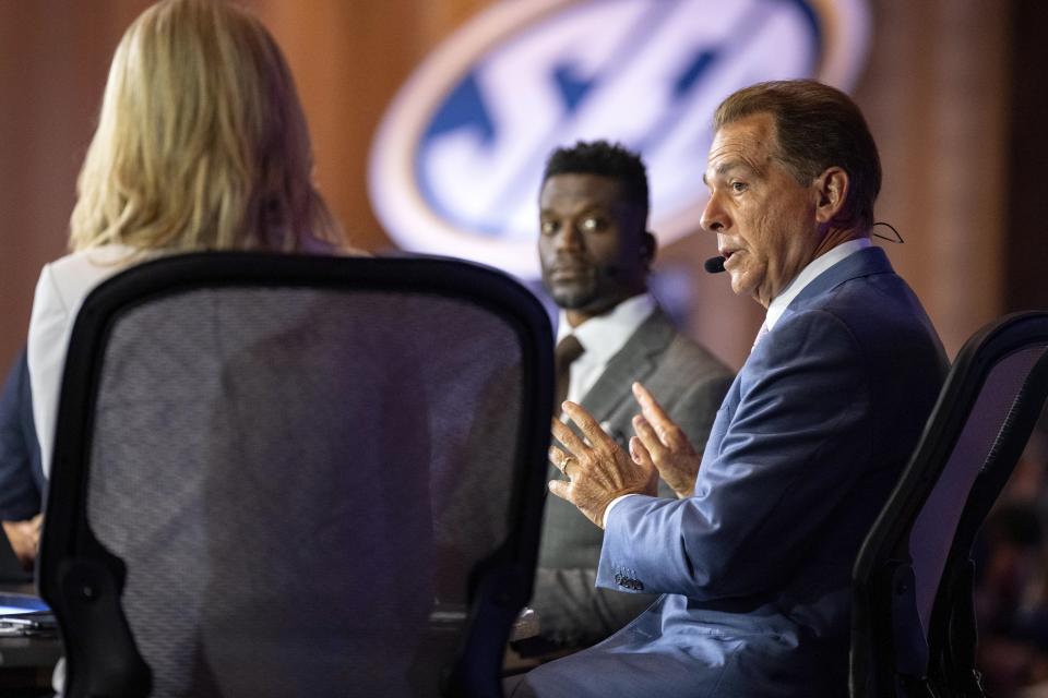 ESPN sportscaster and former football coach Nick Saban speaks during the Southeastern Conference NCAA college football media days Monday, July 15, 2024, in Dallas. (AP Photo/Jeffrey McWhorter)