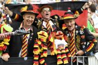 <p>Germany’s fans cheer prior to the Russia 2018 World Cup Group F football match between Germany and Mexico at the Luzhniki Stadium in Moscow on June 17, 2018. (Photo by PATRIK STOLLARZ / AFP) </p>