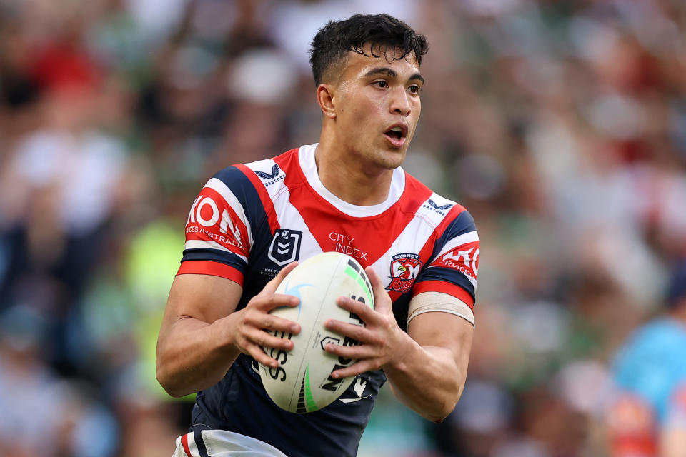 Seen here, Joseph Suaalii readies himself for a tackle while playing for the Roosters in the NRL in 2022. 