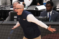 Akron head coach John Groce yells instructions during the second half of a college basketball game against the Creighton in the first round of the NCAA men's tournament in Pittsburgh, Thursday, March 21, 2024. Creighton won 77-60. (AP Photo/Gene J. Puskar)