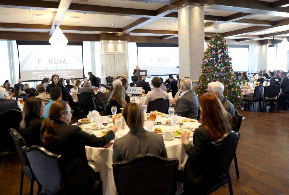 People listen during an Oklahoma City Chamber Forum on the economic impact of a new Oklahoma City Arena, which was held Wednesday at the Petroleum Club in downtown Oklahoma City.