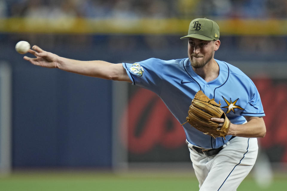 Tampa Bay Rays' Cooper Criswell pitches to the Milwaukee Brewers during the fourth inning of a baseball game Sunday, May 21, 2023, in St. Petersburg, Fla. (AP Photo/Chris O'Meara)