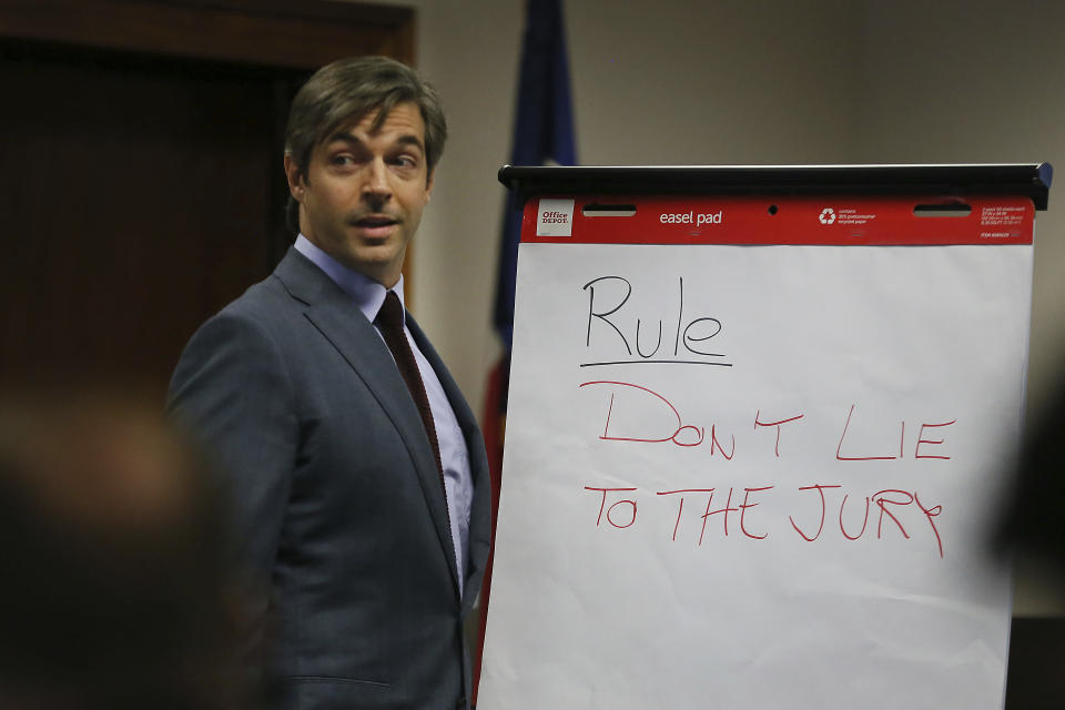 Alex Jones' lawyer Andino Reynal gives his opening statement to the jury Tuesday, July 26, 2022, at the Travis County Courthouse in Austin, Texas. An attorney for the parents of one of the children who were killed in the Sandy Hook Elementary School shooting told jurors that Jones repeatedly “lied and attacked the parents of murdered children” when he told his Infowars audience that the 2012 attack was a hoax. Attorney Mark Bankston said during his opening statement to determine damages against Jones that Jones created a “massive campaign of lies” and recruited “wild extremists from the fringes of the internet ... who were as cruel as Mr. Jones wanted them to be" to the victims' families. Jones later blasted the case, calling it a “show trial” and an assault on the First Amendment. (Briana Sanchez/Austin American-Statesman via AP, Pool)