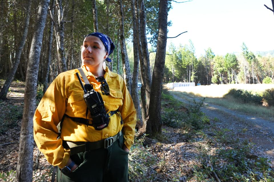 Marlene' Dusek, of Pay-mkawichum, Kumeyaay-Ipai and Cupa descent, prepares for a controlled burn around Karuk ancestral territory, which includes land owned by the U.S. Forest Service and private landowners on Monday, Oct. 3, 2022, as part of an Indigenous Women-In-Fire Training Exchange program.