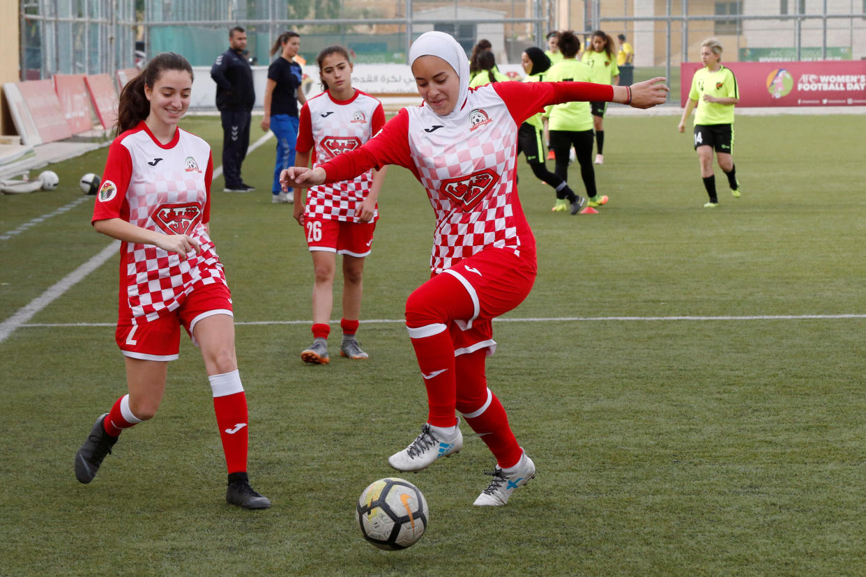 Players of Shabab Al-Ordon Club participate in a training session before their Jordan Women's Pro League soccer match against Al Ahli Club in Amman, Jordan, June 8, 2019.REUTERS/Muhammad Hamed