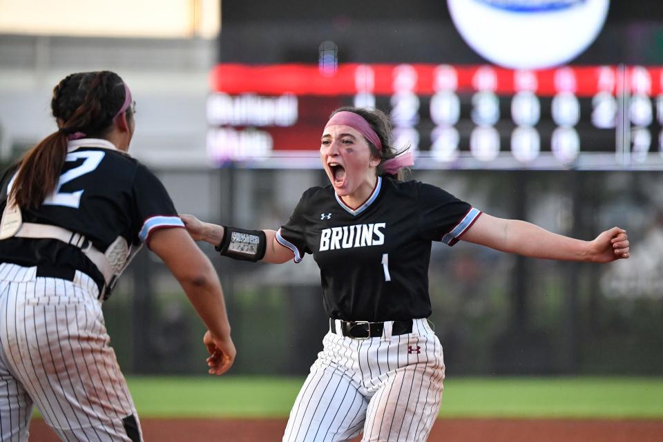 Ballard pitcher Brooke Gray (1) celebrates with catcher Alyssa Simmons (42) during action of their Seventh Region Championship softball game against Male, Monday, May 30 2022 in Louisville Ky. Ballard won 8-7, and will now play for the state championship.