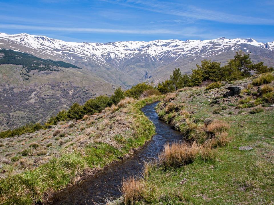 An acequia in the Sierra Nevada Mountains in the High Alpujarras, Granada Province, Spain.