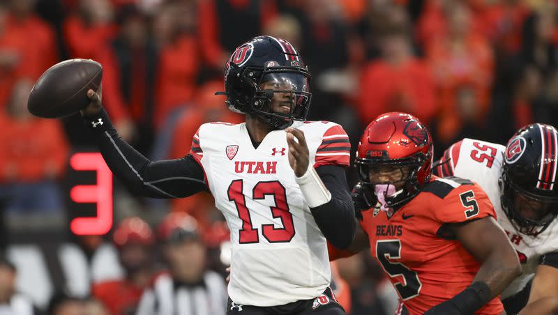 Utah quarterback Nate Johnson (13) drops back to pass against Oregon State during the first half of an NCAA college football game Friday, Sept. 29, 2023, in Corvallis, Ore. 