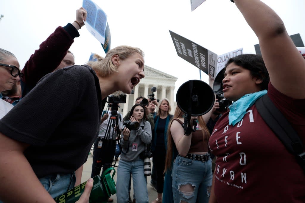 Pro-choice and anti-abortion activists demonstrating outside Supreme Court (Getty Images)