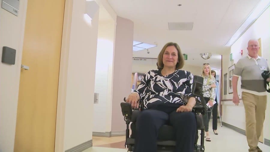 Deanne Niedziela making her last rounds at Providence Mission Hospital in Mission Viejo as her colleagues bid her farewell on her retirement on June 13, 2024. (KTLA)