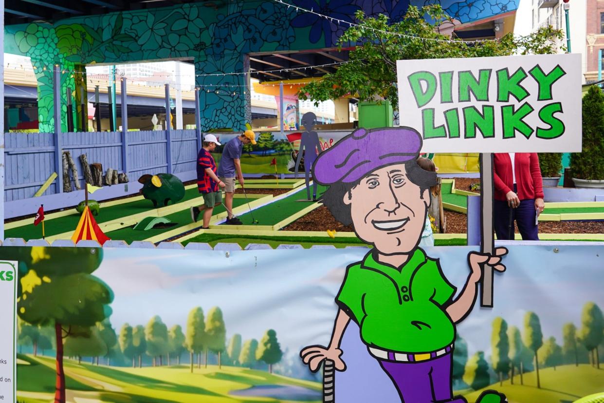 The Milwaukee Public Market's Dinky Rink has been transformed into Dinky Links: A Mini Golf Adventure through June 30, 2024.