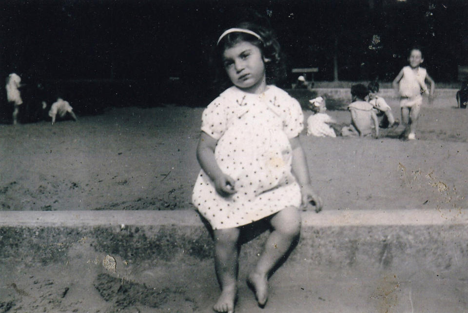 This 1939 photo provided by Olga Weiss, shows her at about 3 years old. For Weiss, the order to stay at home is about much more than simply locking her door to the coronavirus. It has awakened fears from decades ago when she and her parents hid inside for two years from Nazis hunting down Jews in Belgium. (Olga Weiss via AP)