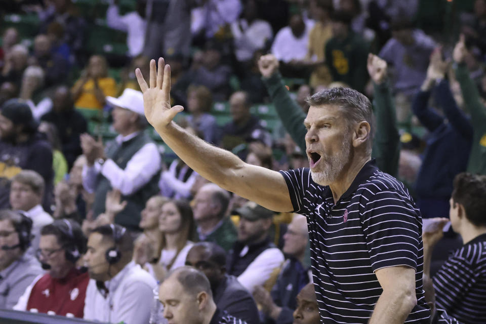 Oklahoma coach Porter Moser calls in a play against Baylor during the first half of an NCAA college basketball game Wednesday, Feb. 8, 2023, in Waco, Texas. (AP Photo/Rod Aydelotte)