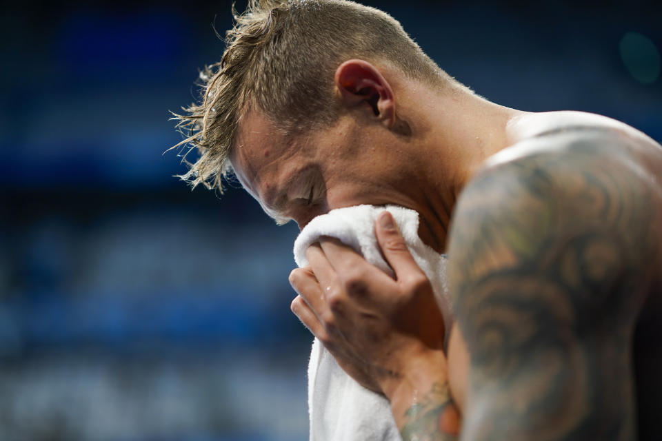 Caeleb Dressel, of United States, celebrates after winning the gold medal in the men's 4x100-meter medley relay final at the 2020 Summer Olympics, Sunday, Aug. 1, 2021, in Tokyo, Japan. (AP Photo/David Goldman)