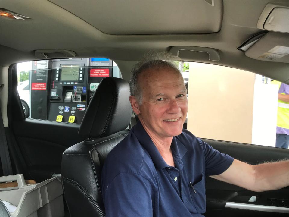 Jeff Rollins of Marlton pulls up for gas at the Costco station outside its Mount Laurel after leaving last week when the were long lines and a long wait