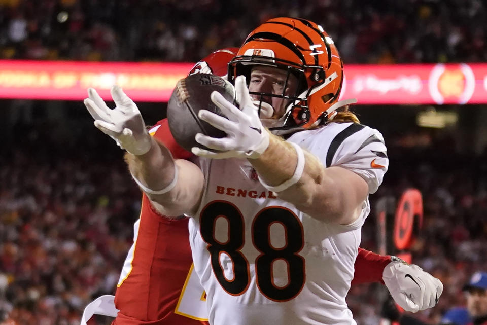 Cincinnati Bengals tight end Hayden Hurst (88) misses the catch against Kansas City Chiefs safety Justin Reid, rear, during the first half of the NFL AFC Championship playoff football game, Sunday, Jan. 29, 2023, in Kansas City, Mo. (AP Photo/Brynn Anderson)