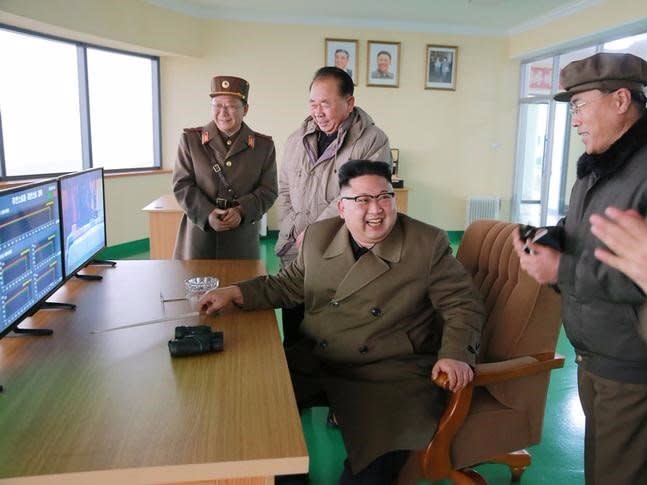 North Korean leader Kim Jong Un watched the ground jet test of a Korean-style high-thrust engine newly developed by the Academy of the National Defence Science in this undated picture provided by KCNA in Pyongyang on March 19, 2017. KCNA/via Reuters