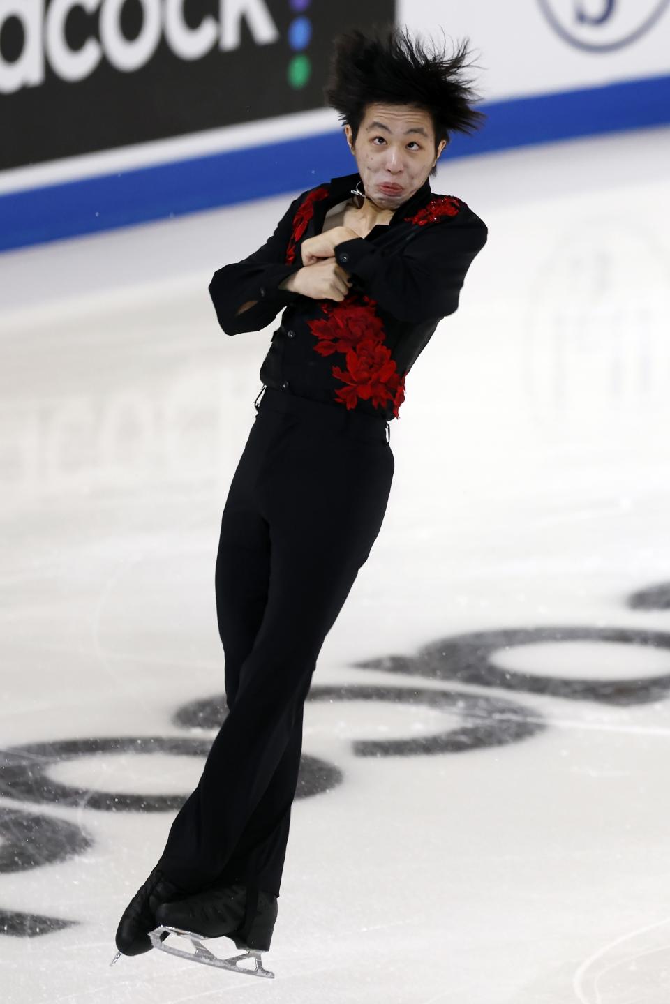 Kao Miura performs in the men's short program during the Grand Prix Skate America Series, Friday, Oct. 21, 2022, in Norwood, Mass. (AP Photo/Michael Dwyer)
